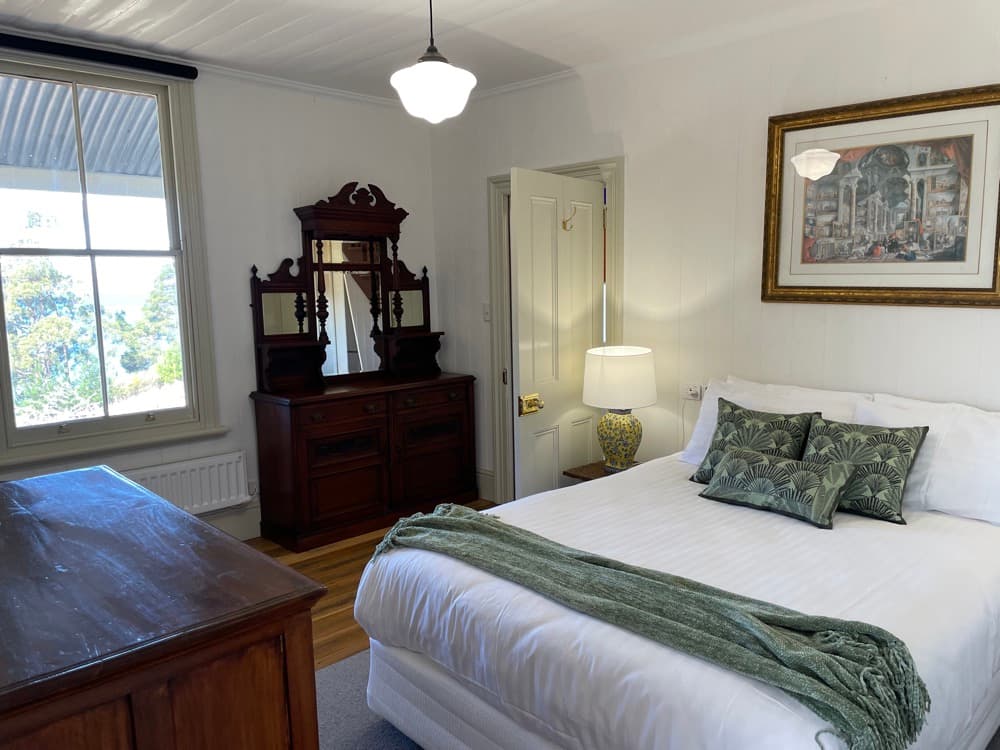 Queen bedroom in 8 person accommodation Tasmania - master bedroom
