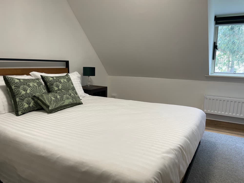 4 bedroom accommodation Tasmania - modern loft bedroom at Flowerpot