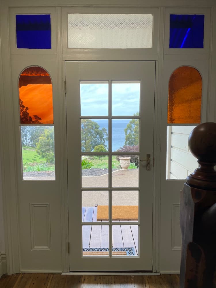 Front entrance of The Cottage at Flowerpot with ocean views